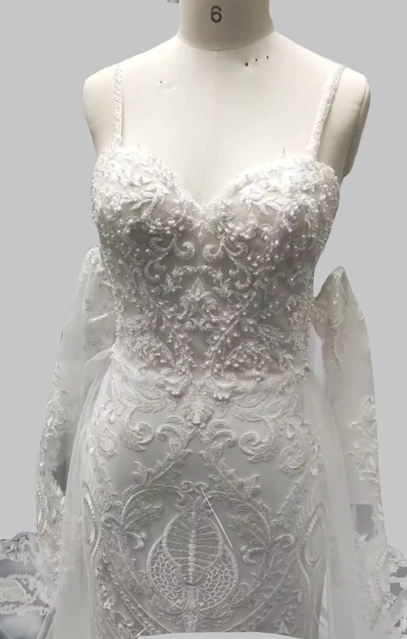 Luxurious Strapless Lace Wedding Dress with Sheer Sleeves and Elegant Train